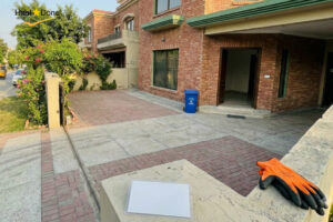 A clean driveway after a professional junk removal service has cleared away old furniture.
